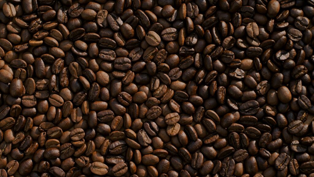 Dark roasted coffee beans close up